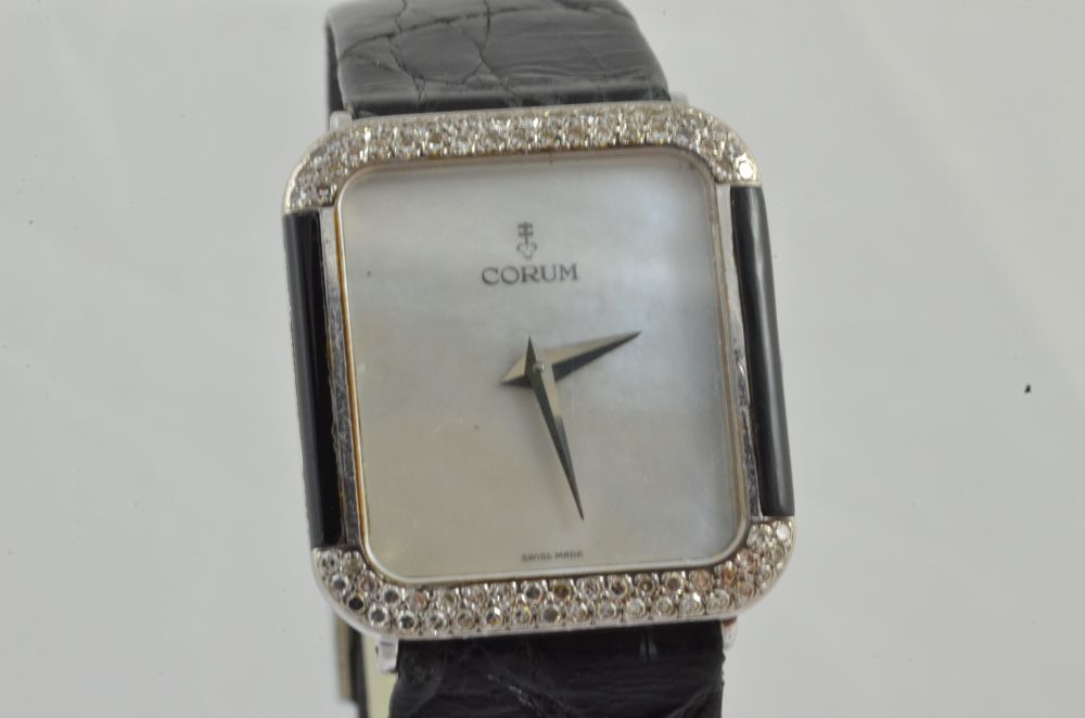 corum quartz coin watch
